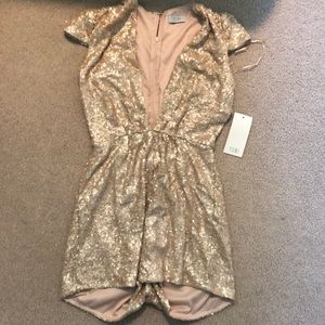 Gold sparkle romper size S